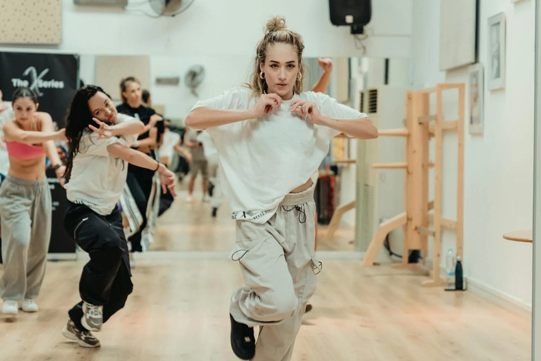 Dance fitness class led by an instructor